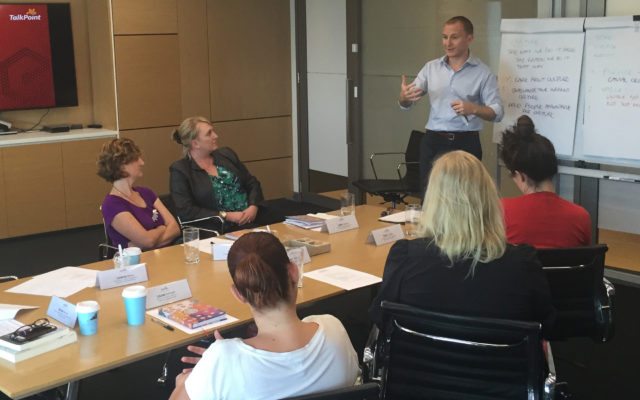 John Colbert holding a Corporate Coaching Workshop - Just one of the solutions Corporate Edge offers for Cultural Alignment