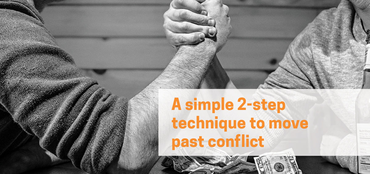 header image of an arm wrestle, symbolising a workplace conflict.